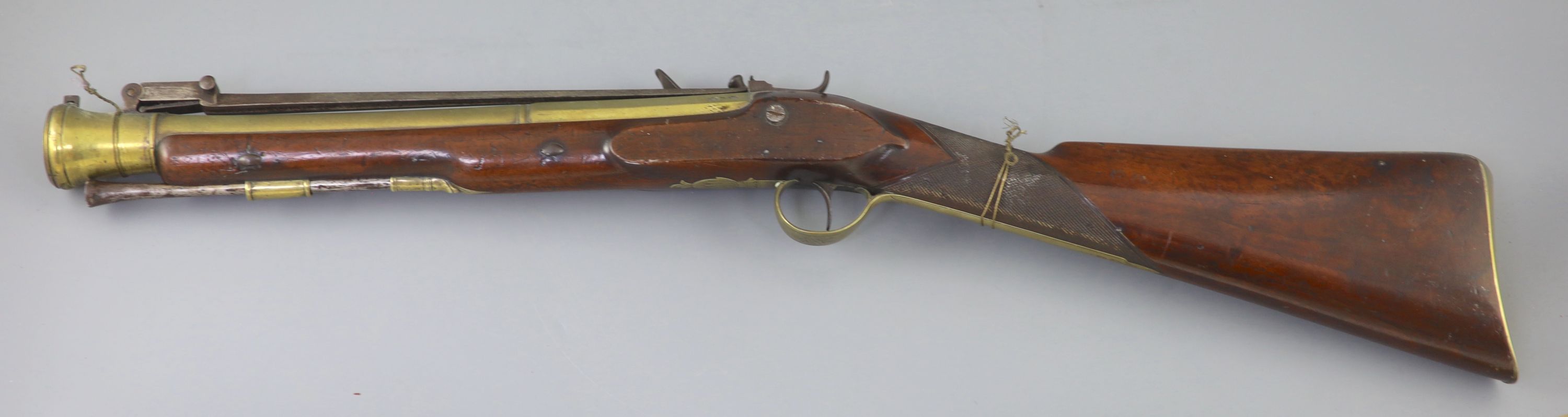 A late 18th century brass barrelled flintlock blunderbuss, by Jones, length 30in.